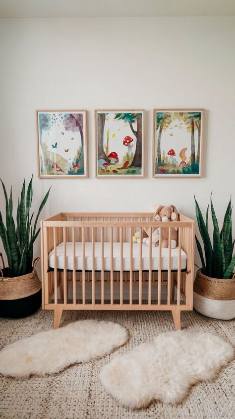 nursery with framed fairy and mushroom artwork above crib Tree Theme Nursery, Boho Forest Nursery, Eric Carle Nursery, Mushroom Themed Nursery, Whimsical Nursery Ideas, Mushroom Baby Nursery, Whimsical Woodland Nursery, Forest Nursery Theme, Magical Nursery