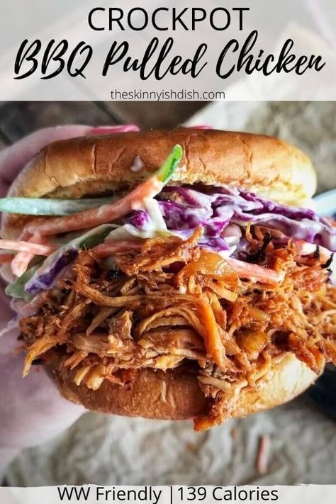 Whether for dinner for your family or for a crowd this Crockpot BBQ Pulled Chicken is an easy way to feed everyone. Your favorite BBQ flavors with a lightened up and healthy spin, this chicken with a cool and crisp coleslaw is great in sandwiches, topping potatoes, nachos and more! #crockpot #bbqchicken #pulledchicken Crockpot Recipes Pulled Chicken, Chicken Pulled Bbq, Crockpot Pulled Chicken Bbq, Shredded Bbq Chicken Crockpot, Crock Pot Bbq Pulled Chicken, Crockpot Bbq Pulled Chicken, Pulled Chicken Crock Pot Recipes, Bbq Pulled Chicken Recipes, Pulled Chicken Recipe