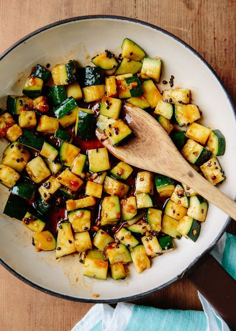 Zucchini bread, zucchini chips, zucchini, zucchini, zucchini. Our goal this week has been to give you a few fresh ideas for this most ubiquitous of summer squash, recipes to wake you up instead of making you hit the snooze button one more time. This stir-fry from Michael Natkin of Herbivoracious is exactly what you need: it's fast, needs only five ingredients, and has a spicy kick. Stir Fry Zucchini, Roasted Zucchini And Squash, Fried Zucchini Recipes, Meatless Dishes, Fried Zucchini, Roast Zucchini, Zucchini Recipe, Zucchini Chips, Zucchini Fries