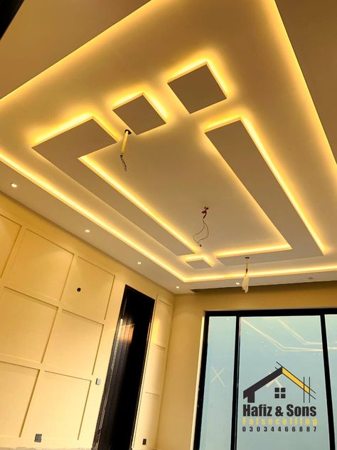 Unleash the potential of your space with our Model Design False Ceiling series. Elevate your surroundings and indulge in the artistry of design. Contact us Now 📞 03034466887 #FalseCeiling #InteriorDesign #EleganceDefined #HomeDesign #HafizAndSonsCeiling #interior #luxurydecor #luxuryhomes #homedecor #LuxuryLiving #CeilingUpgrade #designer #WallDesign #TransformYourSpace #roof #modernfalseceiling Celing Roof Design, Gypsum Board Ceiling, Interiors 2024, Best False Ceiling Designs, Pop Design For Roof, Gypsum Ceiling Design, Simple Ceiling, Board Ceiling, Simple Ceiling Design