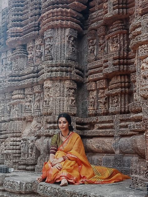 Konark temple builtify Building & Beautifying Homes FACTS ABOUT KONARK SUN TEMPLE • Konark Temple was designed in the form of a gorgeously decorated chariot mounted on 24 wheels. ⚫ constructed by king Narasimhadeva I of Eastern Ganga Dynasty around 1250 CE. ⚫ The temple is in the form of a gigantic chariot elaborately carved stone wheels, pillars and walls. • The wheels at Sun Temple Konark serve as accurate sun dials. ⚫ A heavy magnet was placed at the temple top and every two stones of Temple Women Photography, Temple Saree Look, Temple Saree Photoshoot, Temple Shoot Poses, Poses In Temple Indian, Photo Poses In Temple, Konark Sun Temple Photography, Temple Poses For Women, Temple Photoshoot Women