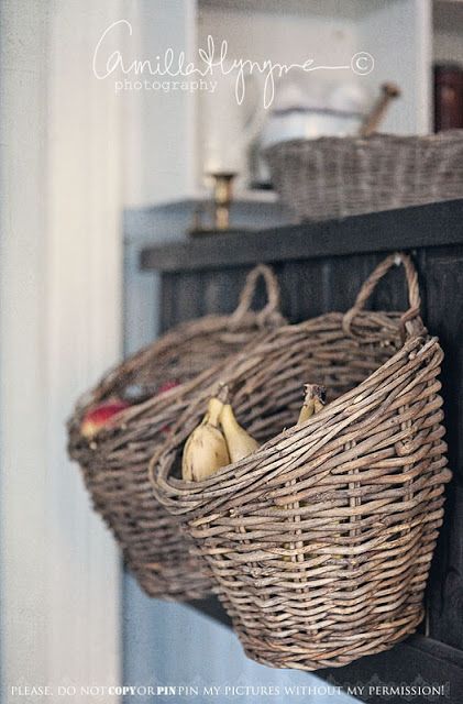 Store your fruit and veggies in a basket on the side of your cabinets. Basket On Wall, Kitchen Redo, Wicker Basket, Fruit Basket, Kitchen Pantry, Rustic Kitchen, Hanging Baskets, Country Kitchen, Wicker Baskets