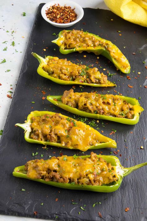 Turkey and Cheddar Stuffed Anaheim Peppers - Stuffed peppers for dinner? Try this stuffed Anaheim peppers recipe filled with ground turkey and cheddar cheese, topped with your favorite hot sauce. #StuffedPeppers #AnaheimPeppers Anaheim Peppers, Chili Pepper Recipes, Stuffed Anaheim Peppers, Stuffed Peppers Turkey, Pepper Recipes, Green Chili Peppers, Cooking Turkey, Peppers Recipes, Chili Peppers