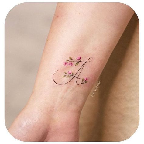 Small Tattoos Daughter, Initials With Flowers Tattoo, Cross Tattoo Back Of Neck, Tattoo Mama E Hija, Letter A Tattoo Ideas, Maiden Name Tattoo, Cute Initial Tattoos, Tattoo Buddhist, Tattoo Dove