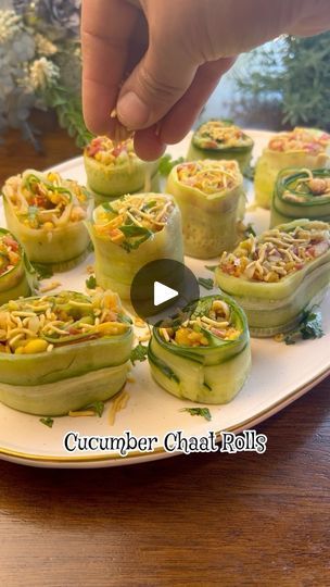 2.3K reactions · 85 shares | Cucumber Chaat Rolls

A perfect unique appetizer, tea time snack or call it salad. These cucumber chaat rolls are so flavors and so cute to serve for any gathering. 

With the summer season around these cool bites are surely going to win your heart and hit your tastebuds.

For the stuffing
(This stuffing is enough for two rolls. I have used large English cucumbers for this recipe. Remember it’s best to use seedless cucumbers for this recipe.)

1.5-2 cups boiled and mashed chickpeas
1 medium sized onion minced
1 medium sized tomato minced
2 green chili chopped (as per spice level)
1 tsp roasted cumin seeds
2 tsp chaat masala
1.5 tsp salt
1/2 tsp black salt
1 tsp red chili powder
1 tsp lemon juice
1 cup bhel mix

Mix well. Remember make the stuffing whenever you Jain Recipes Snacks, Mashed Chickpeas, Lunch Recipes Indian, Unique Appetizers, Cucumber Rolls, Cilantro Chutney, Jain Recipes, Cucumber Bites, Black Salt