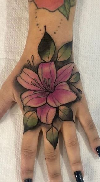 Neo Traditional Lily Tattoo, Water Lily Hand Tattoo, Lily Tattoo Hand, Colorful Lily Tattoo, Lilly Tattoo Traditional, Lilly Hand Tattoo, Hand Tattoo For Woman, Hand Tattoos For Women Flowers, Flower On Hand Tattoo