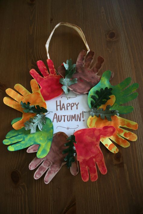 Autumn Handprint Wreath.  My eldest baby helped me make this for my Grandma and Papa back in Fall 2011.  He wasn't even two years old at the time. Memories... #autumn #handprintwreath #preschoolart Handprint Wreath, November Crafts, Happy Autumn, Fall Arts And Crafts, Thanksgiving Crafts For Kids, Handprint Crafts, Daycare Crafts, Fall Crafts For Kids, Autumn Crafts