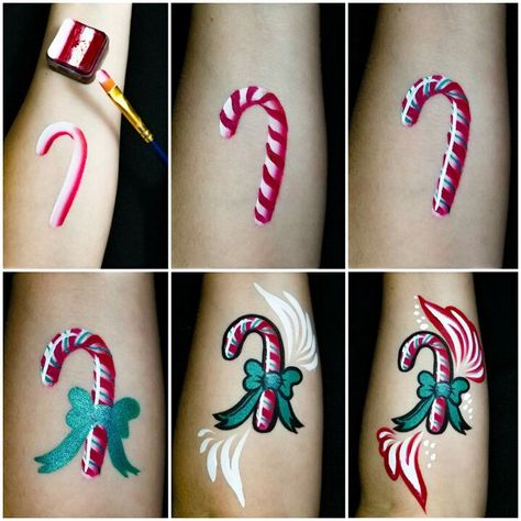 Terrific candy cane step-by-step by our new artist Rep Shelly Polsoni! This is a homemade split cake using our Paradise Red and Wolfe White. DFX Metallic Green for the stripes and bow, and a strong Wolfe White shine really make this look really pop. Christmas Body Painting, Rainbow Face Paint, Fairy Face Paint, Homemade Face Paints, Fair Face, Christmas Face Painting, Split Cake, Cheek Art, Rainbow Face