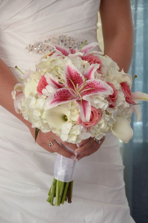 White Hydrangea, white Calla Lilies, Stargazer lilies, & coral roses Stargazer Lily Wedding Bouquet, Stargazer Lily Wedding, Stargazer Lily Bouquet, Lily Wedding Bouquet, Calla Lily Bridal Bouquet, Lily Bridal Bouquet, White Calla Lilies, Calla Lily Bouquet Wedding, Hydrangea White