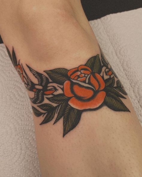 Trad Wrist Tattoo, Traditional Forearm Tattoos For Women, Traditional Flower Knee Tattoo, American Traditional Flower Shoulder, Trad Knee Tattoo, Floral Collar Bone Tattoo Traditional, Red Flower Shoulder Tattoo, Traditional Floral Knee Tattoo, Traditional Wrist Tattoo