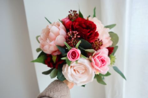 This pretty bouquet is accented with gorgeous silk flowers. It is perfect for an outdoor or woodland-themed wedding. It could be used on the weddings,and also could be used as home decoration,even as a gift for the bridesmaid. Very useful.Meaning of different kinds of bridal bouquet.Rose is the best representative of love,rose bouquet has become the first choice of many couples wedding flowers,but the different colors of rose on behalf of the meaning is not the same : red roses : I love you;Pink Red White Pink Flower Bouquet, Pink And Red Prom Bouquet, Prom Bouquet With Red Dress, Red White And Pink Bouquet, Prom Bouquet Ideas Red Dress, Prom Flowers For Red Dress, Prom Bouquets For Red Dress, Flowers For Red Dress, Prom Flowers Red Dress