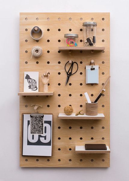 Cute idea to recreate with reclaimed wood and all those dowel offcuts we received from the filter company. #getorganized #reclaimed #wood Hang Pegboard, Wooden Pegboard, Pegboard Storage, Plywood Projects, Large Shelves, Small Shelves, Smart Design, Design Milk, Peg Board