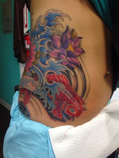 Tattoo stomach koi fish color  Chris Burnett evangel ink Hesperia ca water Side Waist Tattoos Women, Tattoo Stomach, Koi Fish Colors, Fish Color, Stomach Tattoos Women, Stomach Tattoo, Coy Fish, Waist Tattoos, Koi Fish Tattoo