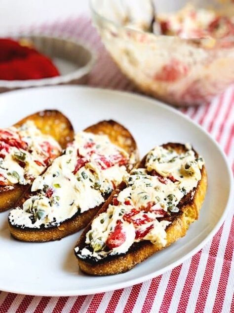 Goat Cheese Caper and Red Pepper Crostini Christmas Crostini, Crostini Appetizer, Cheese Crostini, Goat Cheese Crostini, Goat Cheese Appetizer, Crostini Appetizers, Gluten Free Puff Pastry, Crostini Recipes, Hot Bread