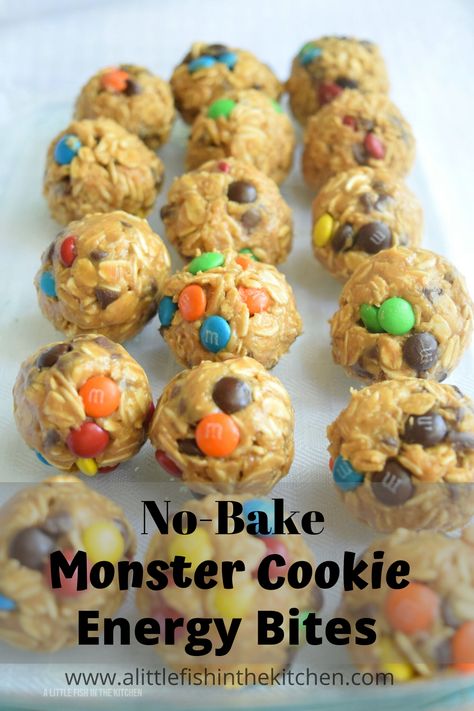 These No-Bake Monster Cookie Energy Bites are easy to make, and they are a reasonably healthy treat to share with friends and family! Use seasonal candy-coated chocolates and these can be a festive addition to any holiday table with joyful pops of color. These are a little bit addictive, so just remember to share! #nobake #nobakedesserts #nobakecookies #energybites #kidfriendly #kidfriendlysnacks #snacks #snacksfortheroad #summerrecipes #afterschoolsnacks #lunchtime #lunchboxrecipes Energy Bites Recipe, Road Snacks, Bake Sweets, Energy Bites Recipes, Monster Cookie, Chocolate Candies, Easy Party Food, Healthy Treat, Lunch Box Recipes