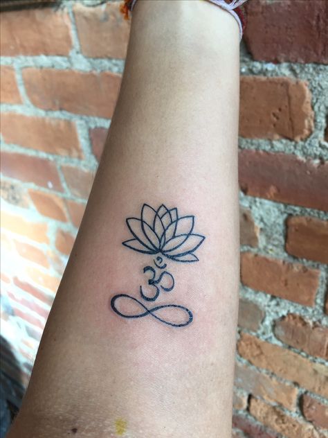 Lotus/ Om/ Infinity tattoo Lotus And Infinity Tattoo, Om With Lotus Tattoo, Infinity Lotus Tattoo, Lotus Infinity Tattoo, Lotus And Om Tattoo, Ohm Lotus Tattoo, Lotus Om Tattoo, Luck Tattoo Ideas, Om Lotus Tattoo