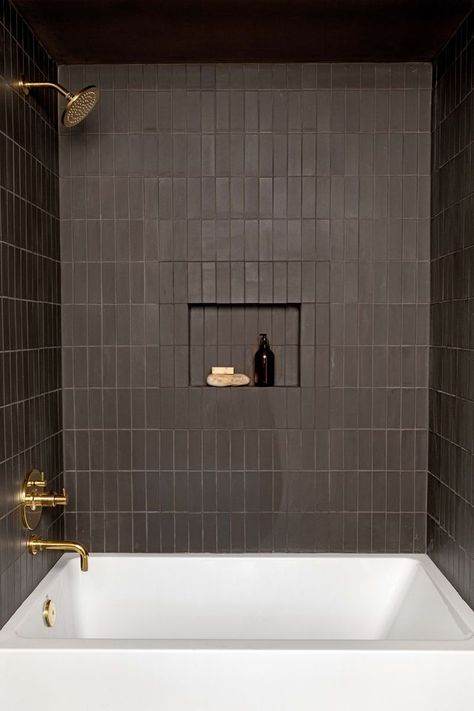 Tile, Bathroom, Room, Wall, Plumbing fixture, Shower, Architecture, Floor, Tap, Flooring, Robert Mckinley, Black Tile Bathrooms, Glam Living Room Decor, Shower Tub Combination, Subway Tiles Bathroom, Glam Living, Glam Living Room, Brown Bathroom, Boys Bathroom