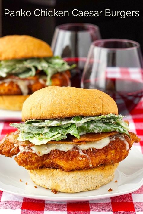 Panko Chicken Caesar Burgers. Easy crispy fried panko chicken breasts make the ideal tender and juicy base for these tasty fast-food alternative chicken burgers. Use your own favourite caesar salad dressing or try our homemade recipe. #chickenburger #lowfatchickenburger #chickensandwich #takeoutrecipes #copycatrecipes Breaded Chicken Burger Recipe, Burgers In Oven, Sick Recipes, Handheld Meals, Oven Burgers, Baked Burgers, Crispy Chicken Burgers, Panko Chicken, Caesar Chicken