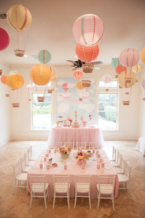 Create one stunning eye-catching display by hanging paper lantern hot air balloons from the ceiling. This is a great idea for an “Up In The Air” baby shower or birthday party! | Photo: Alefiya Akbarally via Kara’s Party Ideas Air Balloon Party, Hot Air Balloon Party, Hot Air Balloon Decorations, Babyshower Party, Ballon Party, Travel Party Theme, Balloon Party, Hot Air Balloons, Baby Shower Balloons