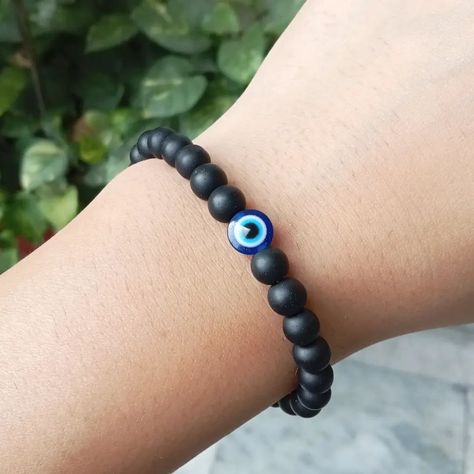 Unisex Bracelets with Evil Eye Protection 🧿 for casual wear and dangling silver charm 🪄 This bracelet shields you against Negativity and it has power to protect and cleanse your energetic space. It also protects you from psychic attacks by healing emotional and physical pain. Order from website link in bio ✅ FREE shipping in Jalandhar. DM for details 📥 #evileyebracelet #evileyejewelry #evileyeprotection #dailywearjewellery #blackbracelets #braceletformen #unisexjewelry #fypage #fy #fyp Psychic Attacks, Daily Wear Jewellery, Evil Eye Protection, Psychic Attack, Physical Pain, Unisex Bracelets, Black Bracelets, Evil Eye Bracelet, Unisex Jewelry