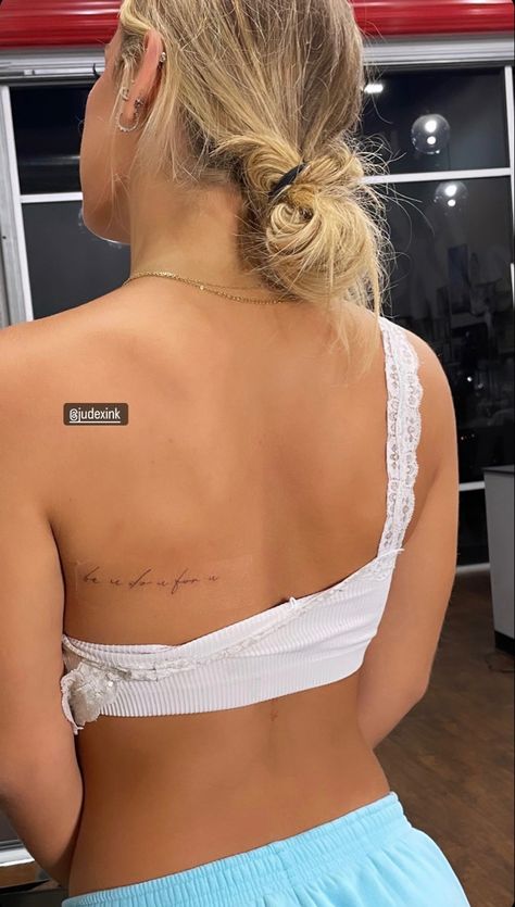 Writing Back Tattoo Women, Discreet Back Tattoos, Side Next Tattoo For Women, Tattoo On Both Sides Of Ribs, Small Cursive Back Tattoo, Thigh Crease Tattoos Women, Women’s Small Back Tattoo, Small Word Back Tattoos, Choosing Yourself Tattoo