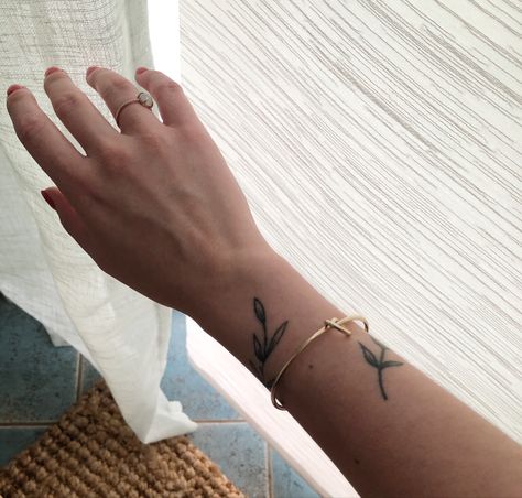 Delicate Flower Wrist Tattoo, Olive Wrist Tattoo, Olive Branch Tattoo On Wrist, Olive Branch Wrist Wrap Tattoo, Botanical Wrist Tattoo, Olive Branch Arm Tattoo, Leaves Tattoo Wrist, Branch Tattoo Wrist, Wrist Leaf Tattoo