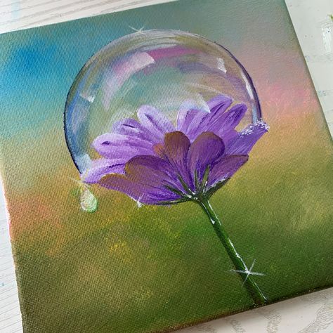 An acrylic painting on canvas with blurry background that looks like a park or garden. There is a purple flower as the main object of the painting, wrapped with beautiful shiny bubble Acrylic Bubble Painting, Paint Acrylic Flowers, Bubble Paintings, Painting With Bubbles, Acrylic Reference, Painting Bubbles, Drawing Ideas Flowers, Bubble Drawing, Acryl Painting