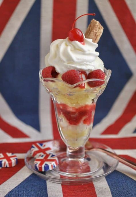 Knickerbocker Glory in front of Union Jack Knickerbocker Glory, Fruit Sauces, British Party, Blueberry Sauce, Raspberry Sauce, Cold Desserts, Wafer Cookies, Strawberry Sauce, Ice Cream Treats