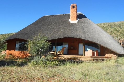 South Africa's Luxe and Low-Key Tswalu Redefines the Safari - Fathom Botswana Architecture, Thatched House South Africa, Thatch House, Round Homes, Mud Houses, African Lodge, Kalahari Desert, Wood Bathtub, African House