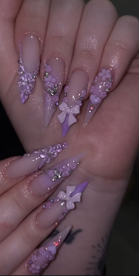 Gel Nail Designs With Charms, Purple Nails Asthetics, Birthday Nail Set Ideas Purple, Lavender Bling Nails, Lilac Birthday Nails, Lavender Prom Nails Acrylic, Repunzle Themed Nails, Lilac Valentines Nails, Purple Princess Nails