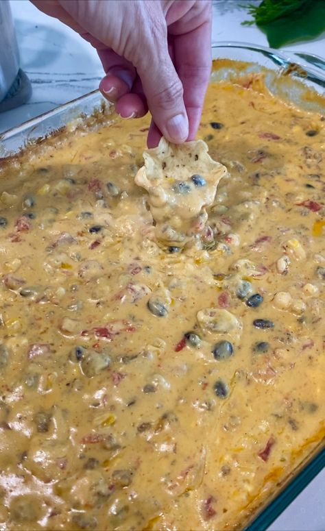 Want to take your appetizer game to the next level? You have to try this Cowboy Queso Dip recipe. A combination of 3 cheeses loaded with sausage, black beans, corn and spices for the ultimate cheesy dip everyone will love.It's almost football season and you know what that means? Tailgate food! When I think of tailgating food I think of hot dogs, burgers and all the dips. This Cowboy Queso Dip is next level delicious! Simply throw everything into a baking dish or slow cooker and heat until ... Loaded Cowboy Cheese Dip, Cowboy Queso Dip, Cowboy Queso, Cheesy Queso Dip, Queso Dip Recipe, Black Beans Corn, Queso Dip Recipes, Cheesy Dip, Football Party Food