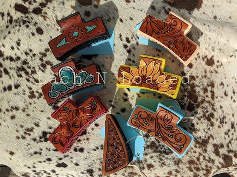 "Super cute and functional art for your hair. Claw Clips are a definite must have and why not have one that's extra fancy with hand tooled and painted leather designs!All are medium size  3.25\" clips and the triangle one is 3\"." Hair Clip Craft Ideas, Country Hairstyles, Leather Patterns, Leather Designs, Hair Claw Clips, The Triangle, Painting Leather, Claw Clips, Leather Work