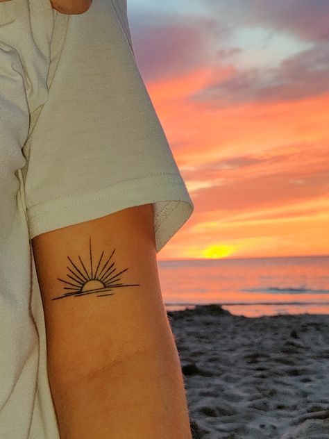 Sun On Forearm Tattoo, Sun Chaser Tattoo, Your The Sun To Me Tattoo, From The Rising Sun To The Setting Same Tattoo, Sunset Tattoo Placement, Sunset Tattoo Ideas For Women, Sun With Ocean Tattoo, Half Sun Arm Tattoo, Sun On Water Tattoo