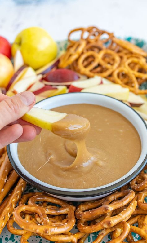 This is the best caramel dip ever. Made on the stove with butter, sugar, and sweetened condensed milk, it's the perfect consistency for dipping pretzels and apples. #homemadecaramel #carameldip #easycaramelrecipe #bestcaramel #thebestcaramel #bestcaramelrecipe #caramelapples #dippingcaramel Diy Caramel Dip For Apples, Best Caramel For Apples, Best Caramel Apple Dip, Homemade Caramel Apple Dip, Carmel Dip For Apples, Homemade Caramel For Apples, Apple Caramel Dip, Homemade Caramel Dip, Caramel Dip For Apples