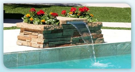 This is fun for just about any pool because it's just a small bench and planter that spouts water. Plus it's easier to accomplish yourself because the planter covers all the waterworks. Pool Waterfall Diy, Pool Waterfall Landscaping, Pool Waterfalls, Waterfall Landscaping, Swimming Pool Waterfall, Diy Waterfall, Pool Water Features, Pool Remodel, Diy Swimming Pool