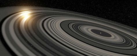 Exoplanet J1407b - the first ringed planet to be discovered outside the solar system. Its ring system is roughly 200 times larger than that of Saturn, and likely contains small 'shepherd' moon similar to Saturn's Pan and Daphnis. Planetary Rings, Rings Of Saturn, Alien Life, University Of Rochester, Huge Rings, Gas Giant, The Solar System, Space Telescope, Light Year