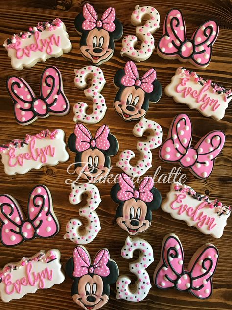 Minnie Mouse birthday cookies by Bakealatte.  www.facebook.com/Bakealatte Three Minnie Mouse Birthday, Minnie Mouse Party Treats Dessert Tables, Minnie Mouse Chalkboard Sign, Minnie Mouse Biscuits, Minnie Mouse Themed Cookies, 3 Minnie Mouse Birthday, Minnie Mouse Theme 2nd Birthday, Minnie Mouse 3 Rd Birthday Party Ideas, Minnie Mouse Birthday 3rd Party Ideas