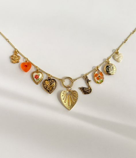 something bright for summer 🍊🦢🌺 #summerjewelry #charmnecklace #jewelryinspo #summerfashion #festivalfashion Trendy Gold Charm Necklaces For Summer, Bohemian Summer Charm Necklaces As Gifts, Summer Trendy Charm Necklaces, Summer Flower Charm Jewelry, Summer Flower Charm Necklaces, Curated Ears, Necklace Layering, Summer Jewelry, May 21