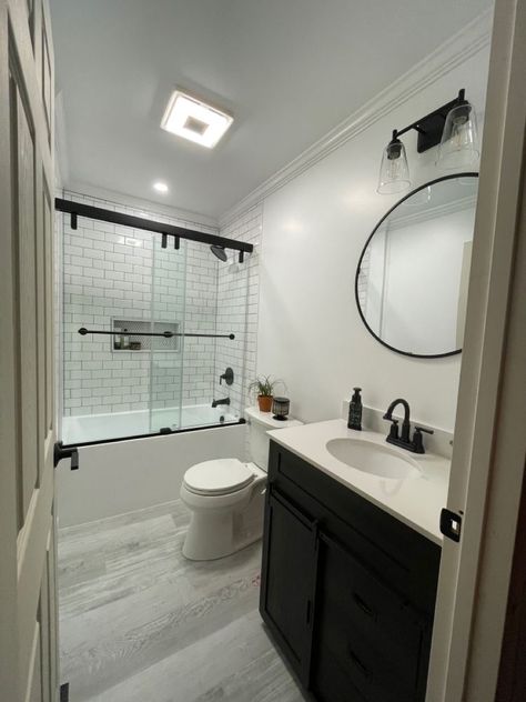 White Tub With Black Fixtures, Black Shower Fixtures Small Bathrooms, Small Bathroom Design Black Fixtures, Modern Restroom Ideas Small Spaces, Bathroom Remodel Matte Black, White Shower With Black Fixtures, Black Fixtures Bathroom Ideas, Small Bathroom Ideas Black Fixtures, Bathroom Design With Black Fixtures