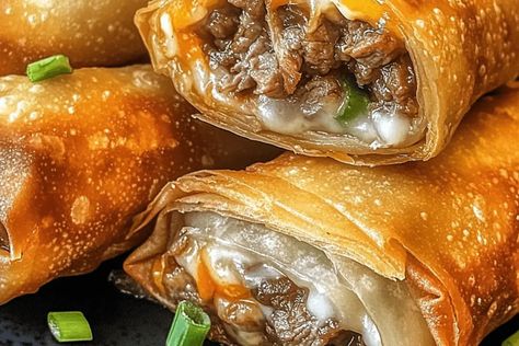 Crispy, Cheesy Philly Cheesesteak Egg Rolls Egg Roll Philly Cheese Steak, Steak Egg Rolls, Philly Cheesesteak Egg Rolls, Philadelphia Cheesesteak, Sautéed Veggies, Cheese Steak, Philly Cheese, Tailgating Recipes, Cheese Rolling