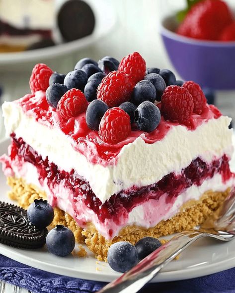 No-Bake Berry Cheesecake: Easy Layered Berry Bliss Recipe Mixed Berry No Bake Cheesecake, Cheesecake Berry Topping, Very Berry Cheesecake, No Bake Berry Dessert, No Bake Raspberry Cheesecake Recipes, No Bake Raspberry Cheesecake, Triple Berry Cheesecake, Mixed Berry Cheesecake, Mixed Berry Dessert