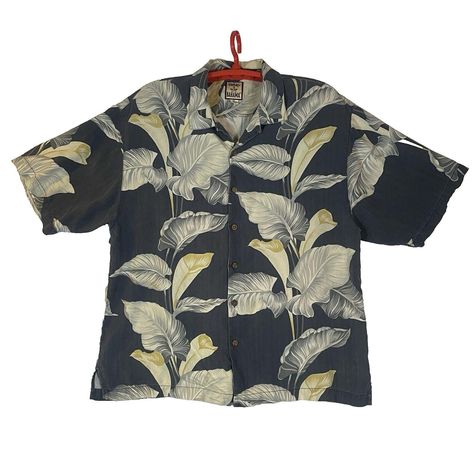 Tommy Bahama Vintage Mens Size XL Floral Hawaiian 100% Silk Shirt Blue Cream Leaves. Circa 1990s or early 2000s. Washable silk with buttons that look like wood (not sure what the material is). Slate grayish blue background with big cream/off-white leaves. There is some white streaking all over the background, but I think it is part of the design since it is everywhere and not actual wear (see a few photos to show). Clean pre-owned condition. There is a faint discoloration on the front that isn't very noticeable, all additional cleaning left up to the buyer. Light wash wear, but nothing significant. Very top button (that isn't used) is gone, but there is a spare still sewn on inside tag. Review photos carefully for all details. THANK YOU FOR VIEWING MY LISTING! Items are sold "AS IS". Pleas Cary Nc, Grayish Blue, Greyish Blue, White Leaf, Mens Oxfords, Silk Shirt, Blue Cream, Tommy Bahama, Blue Backgrounds