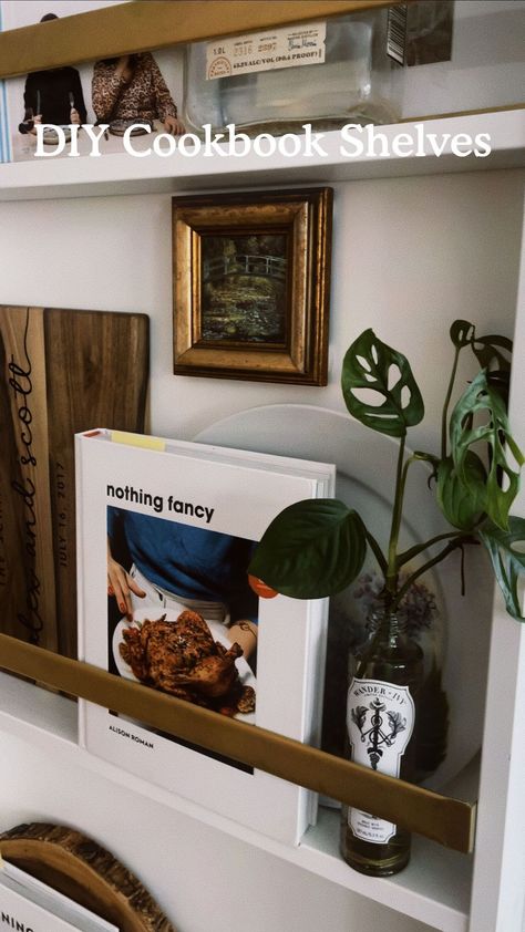 Our cookbook shelves are one of my favorite corners of our home and the easiest DIY! This project can be adjusted to fit so many little… | Instagram Kitchen Book Shelves, Cookbook Wall Display, Cookbook Display In Kitchen, Cookbooks In Kitchen Displaying, Cookbook Shelf In Kitchen, Cookbook Bookshelf, Recipe Book Storage, Recipe Book Display, Kitchen Cookbook Storage