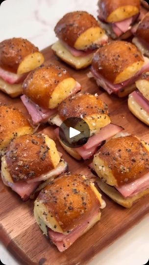 1.1K views · 242 reactions | MINI HAM & SWISS BITES!  Ingredients: -King’s Hawallan Pretzel Bites -Honey ham (cut into small bite-sized squares) -Swiss cheese -1/2 tbsp poppy seeds -1 tbsp Dijon mustard -1/4 c butter (melted) -1/2 tbsp onion powder -1/2 tsp Worcestershire sauce  Preparation: 1. Slice King’s Hawaiian Pretzel Bites in half (lengthwise) 2. Assemble mini Ham & Swiss bites with sliced ham and Swiss cheese 3. Mix melted butter, Dijon mustard, Worcestershire sauce, poppy seeds, and onion powder, then brush on top of Ham & Swiss bites 4. Cover bites with foil and bake at 350 for 10 minutes (or until cheese is melted), then remove foil and bake an additional 3-5 minutes #kingshawaiian | Darbie Angell | altego_music · SYMPHONY x SUMMERTIME SADNESS Ham And Swiss Cheese Cracker Melts, Mini Ham And Swiss Bites, Hawaiian Bread, Ham And Swiss, Pretzel Cheese, Honey Ham, Easter Appetizers, Hot Appetizers, Mini Bites