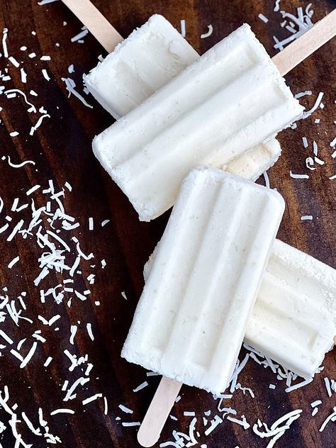 Paletas de Coco (Coconut Ice cream) - Coconut Cream Bars, Coconut Ice Cream Bars, Mexican Sour Cream, Strawberry Water, Mexican Crema, Fruit Pops, Ice Cream Cart, Coconut Ice Cream, Icecream Bar