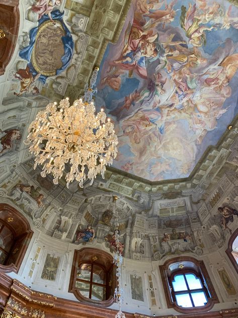 art mural on the ceiling with pastel colours and heavenly figures clouds and chandelier light academia vibes in belvedere palace Vienna Austria Light Academia Vibes, Vienna Trip, Vienna Austria Travel, Belvedere Palace, Vienna Waits For You, Church Aesthetic, Ceiling Painting, Ceiling Art, Dream College