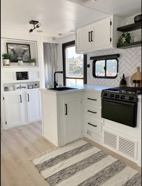 Camper White Interior, Modern Farmhouse Rv Decor, Farmhouse Style Camper, Black And White Camper Decor, Gray And White Camper Interior, Camper Renovation Kitchen, Vintage Winnebago Remodel, Modern Caravan Interior Ideas, Rvs And Campers