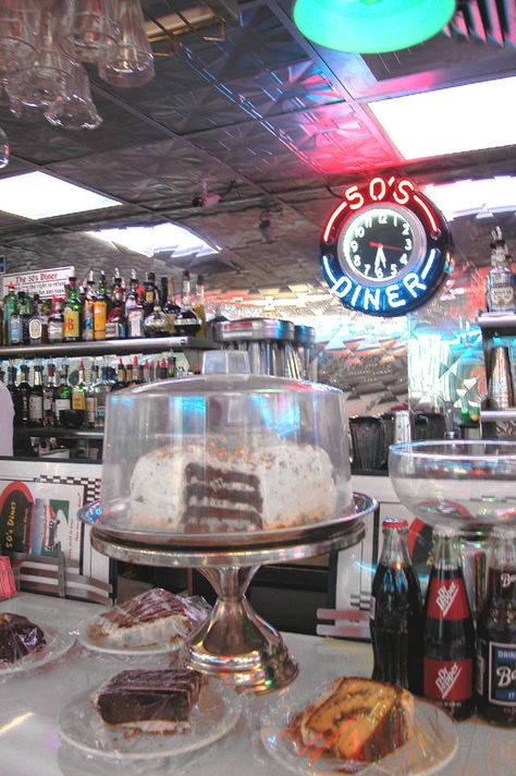 Let them eat cake. Diner Cake, 50s Cake, Malt Shop, Food Display Stands, Diner Aesthetic, Retro Restaurant, 1950s Diner, Diner Food, 50's Diner