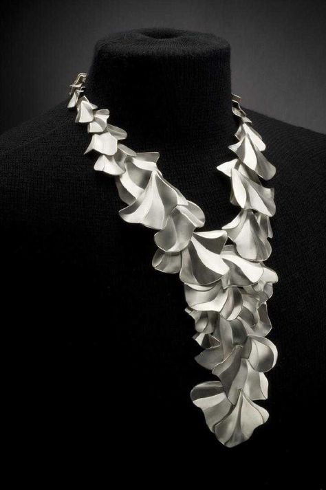 "Cascading necklace was designed and produced by award winning jewelry artist, Davina Romansky Batal. Having won the prestigious Niche Award (silver category)and a Saul Bell Design Award Finalist (silver category), this piece is one of only 2 produced; the other \"Cascading\" necklace is part of Burchfield Penney Art Museum's permanent collection. This necklace was published in: Best of American Jewelry Artists Volume 2, Niche Magazine, Rochester Magazine, and one of only 38 jewelry pieces chose Connoisseurs Jewelry Cleaner, Womens Necklaces Silver, Contemporary Jewellery Necklace, Cascade Necklace, Award Winning Jewelry, Contemporary Jewelry Design, Bell Design, Jewelry Artist, Art Jewelry Contemporary