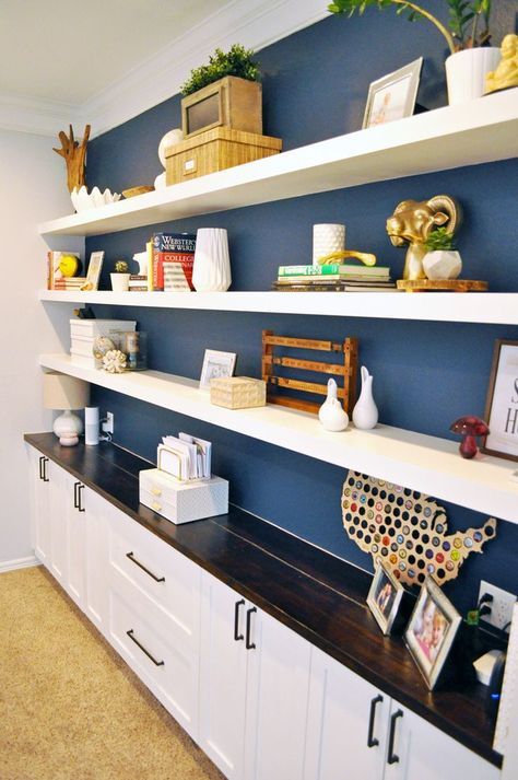 I'm seeing LOTS of rooms with a single dark-colored wall right now - mostly blues and blacks. It only seems to work well, though, when paired with a pure, bright white. #interiordesign #color #shelving Ikea Wall Storage, Credenza Tv, Ikea Floating Shelves, Ikea Built In, Home Office Shelves, Floating Shelves Living Room, Ikea Wall, Credenza Design, White Floating Shelves